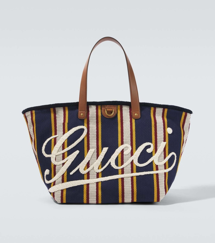 Photo: Gucci Logo striped leather-trimmed canvas tote bag