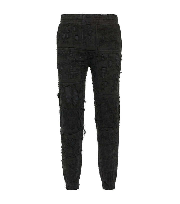 Photo: Givenchy - Distressed cotton sweatpants
