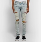 AMIRI - MX1 Skinny-Fit Panelled Distressed Stretch-Denim Jeans - Men - Light blue