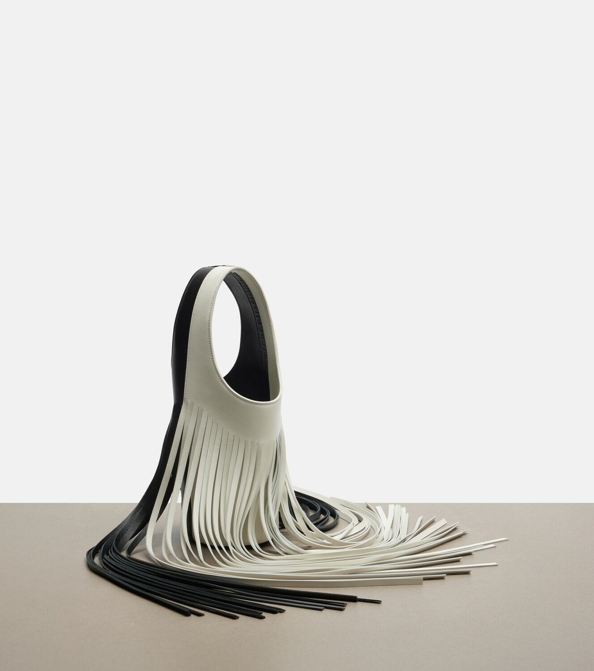 Khaite Livia Small fringed leather tote bag