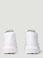 Comme des Garçons x Salomon Pulsar Platform Sneakers