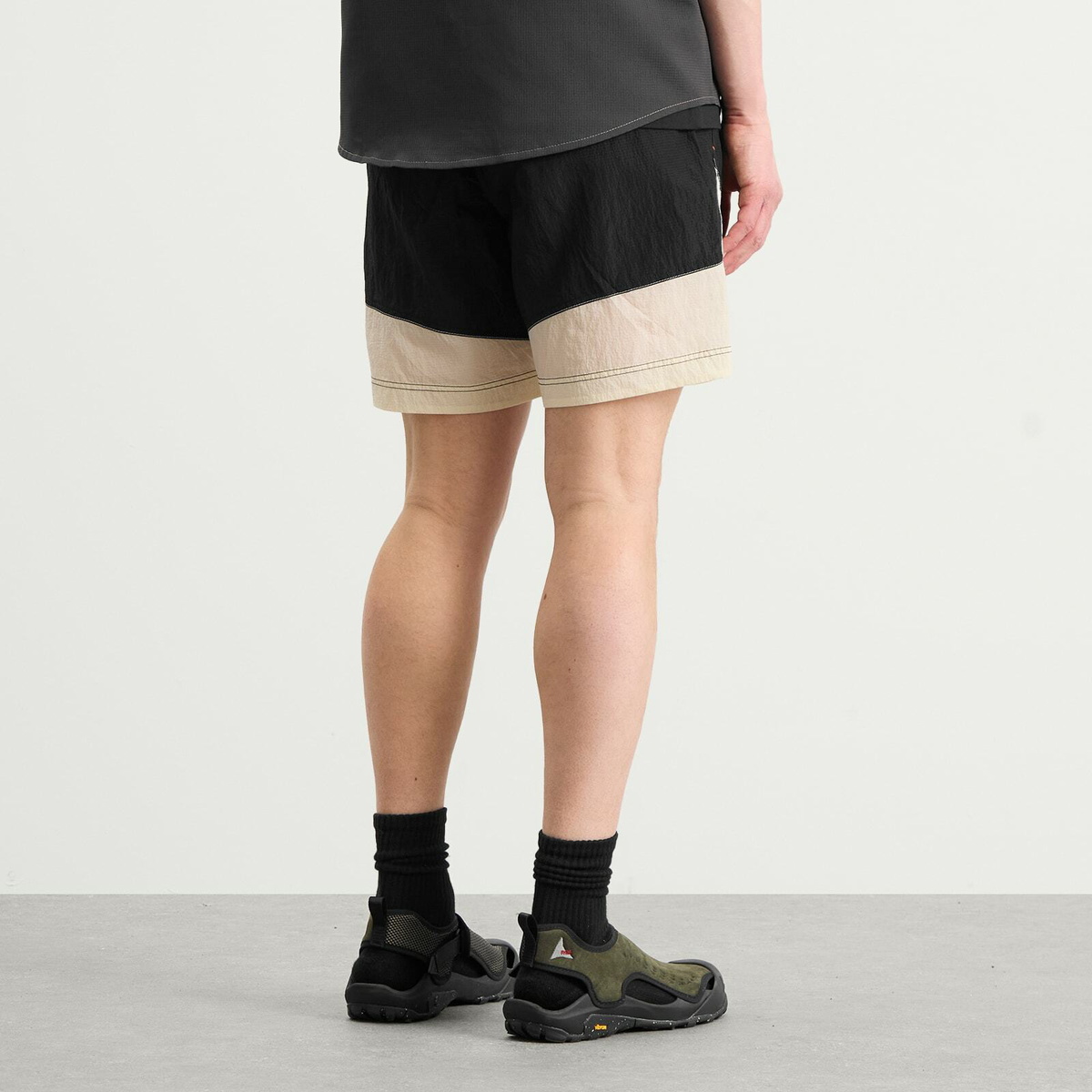 and wander Men's x ROA Ripstop Wind Shorts in Off White