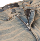 AMIRI - MX1 Skinny-Fit Panelled Distressed Stretch-Denim Jeans - Men - Blue