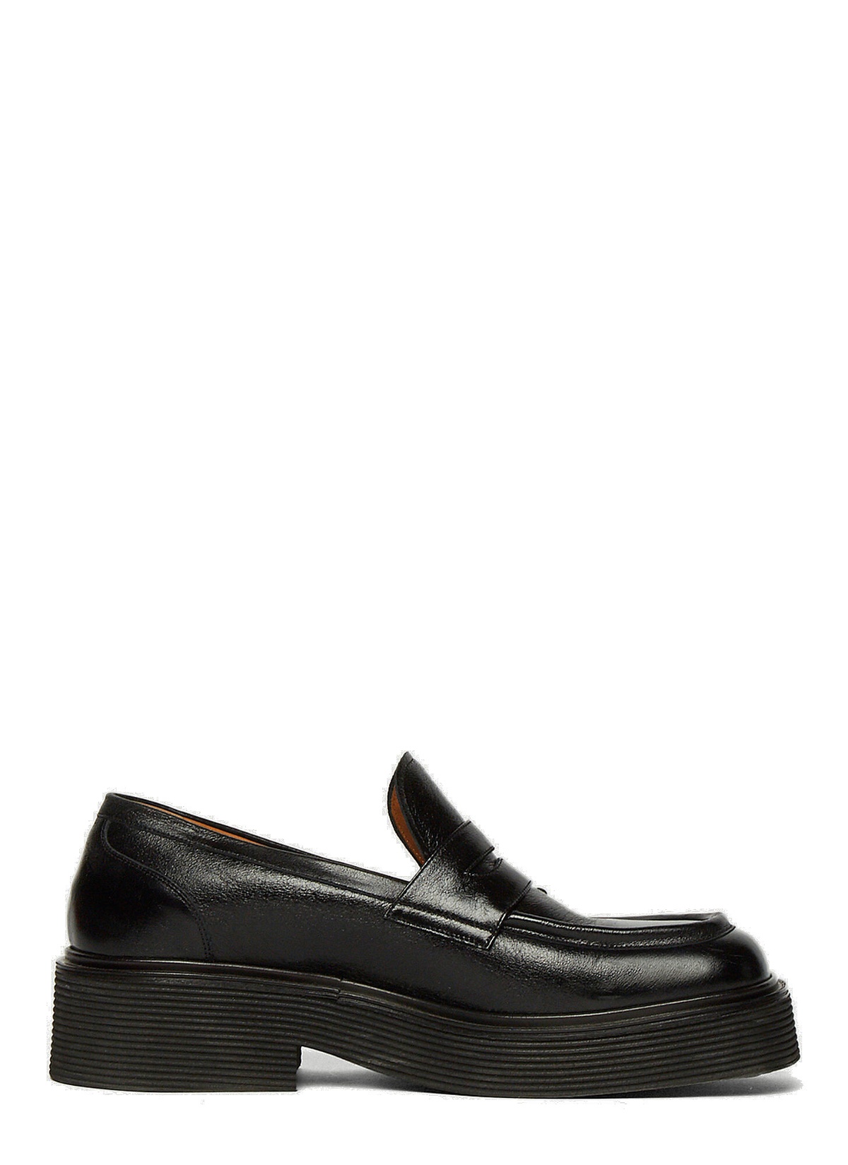 Photo: Pierced Penny Loafers in Black
