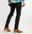 AMIRI - MX1 Skinny-Fit Distressed Leather-Panelled Stretch-Denim Jeans - Black