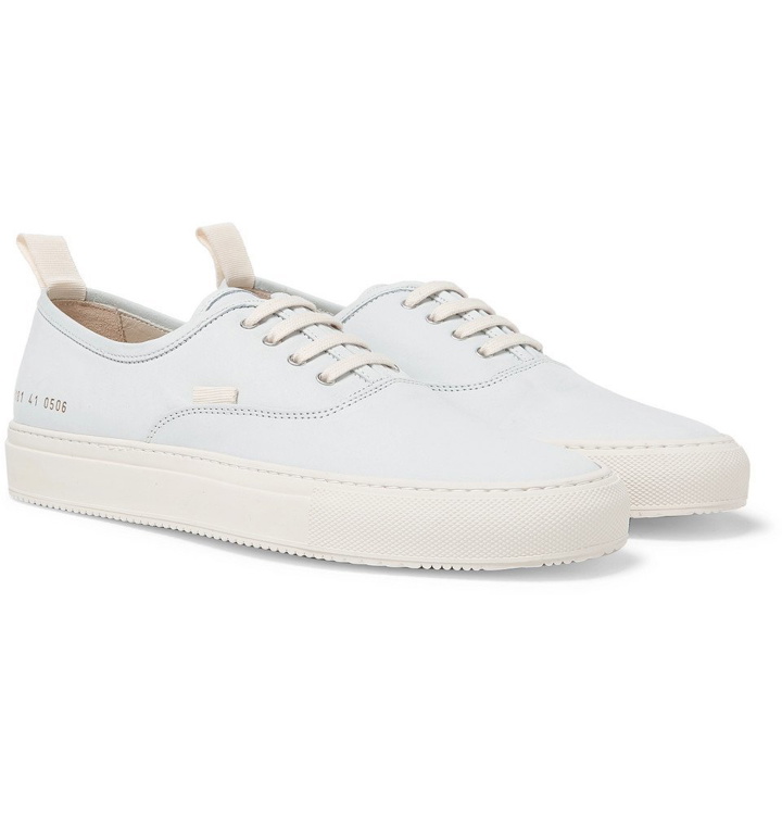 Photo: Common Projects - Tournament Four Hole Nubuck Sneakers - Light blue