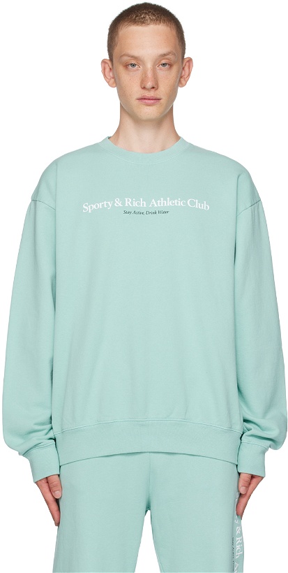 Photo: Sporty & Rich Blue Athletic Club Sweatshirt