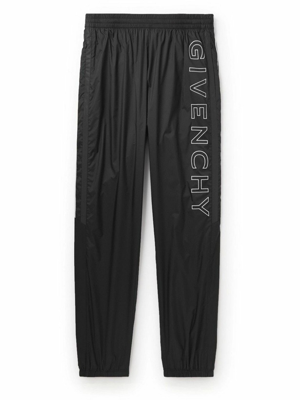 Photo: Givenchy - Tapered Logo-Print Shell Track Pants - Black