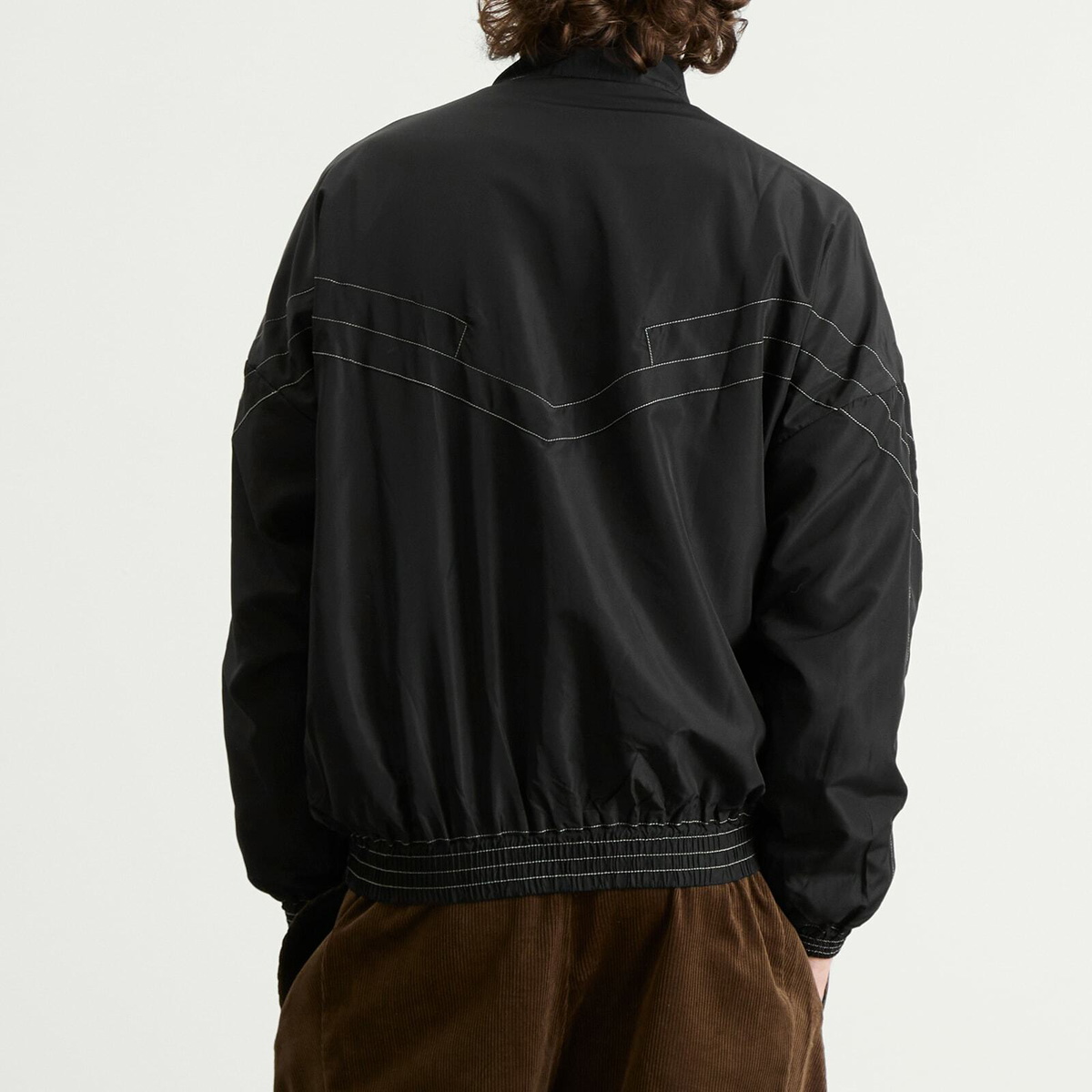Umbro Men's Relaxed Track Jacket in Black