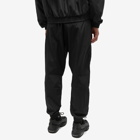 Nike Men's Tech Pack Woven Pant in Black