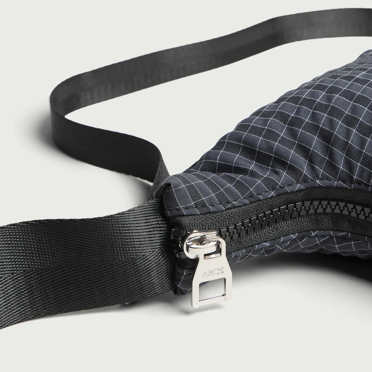 ARCS Tiny HEY Sling Bag in Atlas Grid