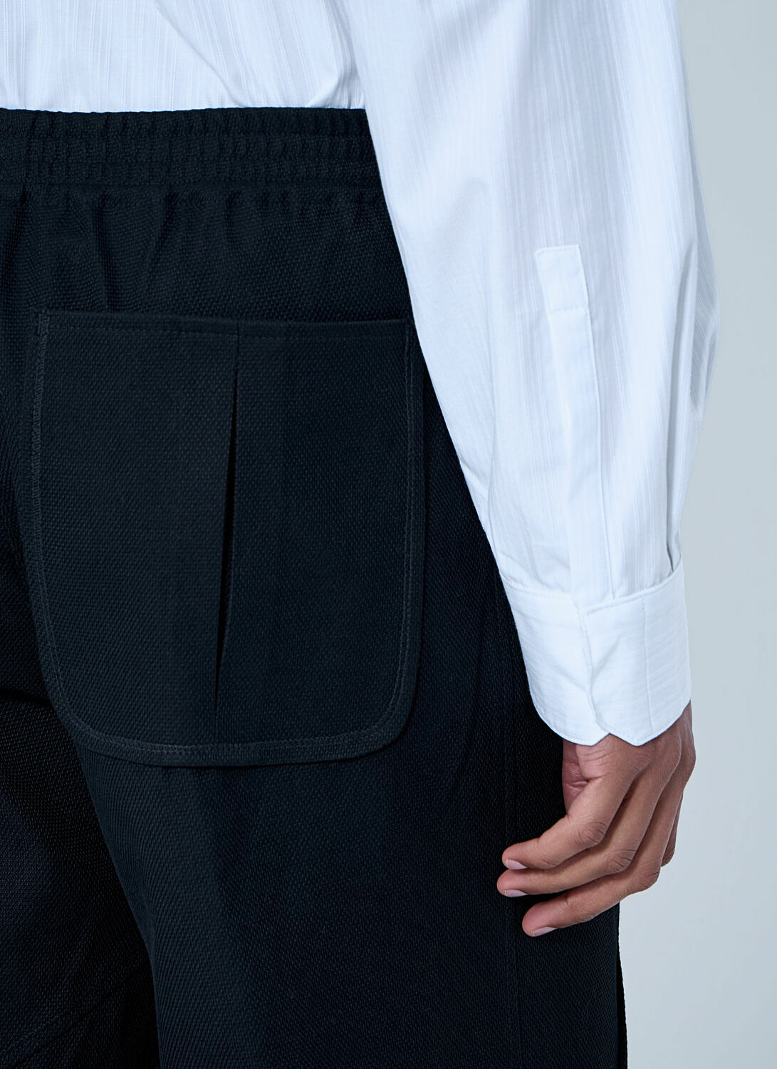 Kiko Kostadinov High-Waisted Pleated Trousers