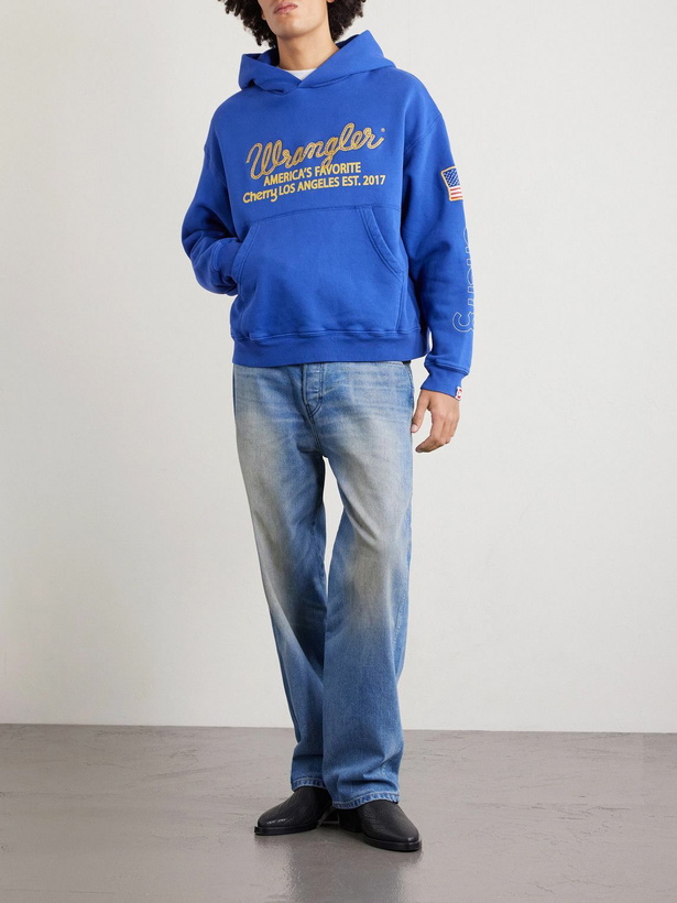 Photo: Cherry Los Angeles - Wrangler America's Favorite Logo-Embroidered Printed Cotton-Fleece Hoodie - Blue