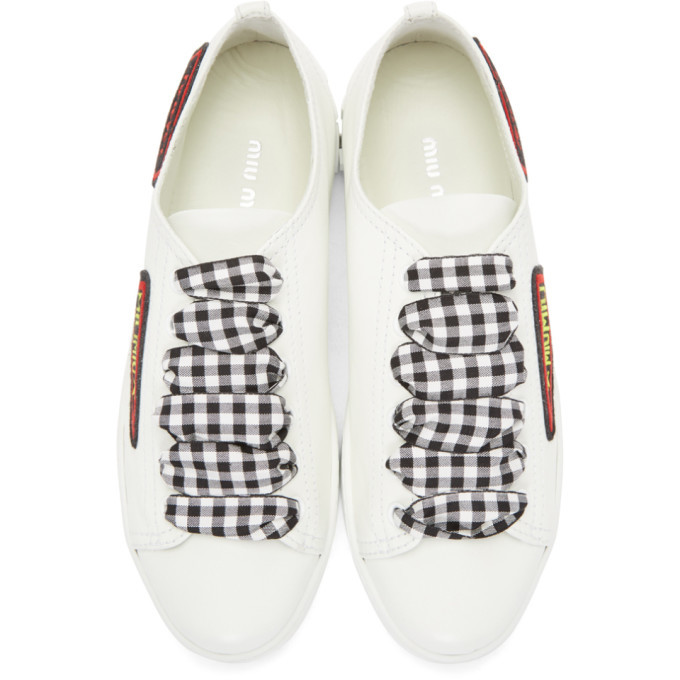 With a white リボントレーン Miu Miu White Gingham Ribbon Sneakers Miu Miu