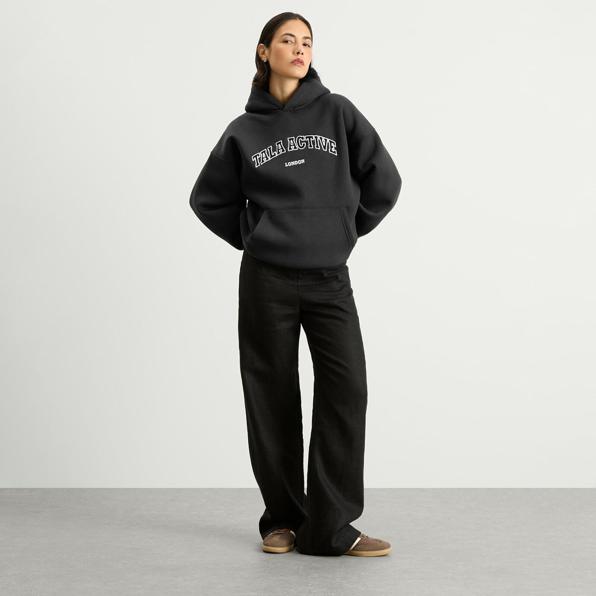 TALA Women's Oversized Active Logo Hooded Sweatshirt in Vintage Black