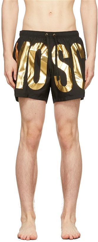 Photo: Moschino Black & Gold Logo Swim Shorts