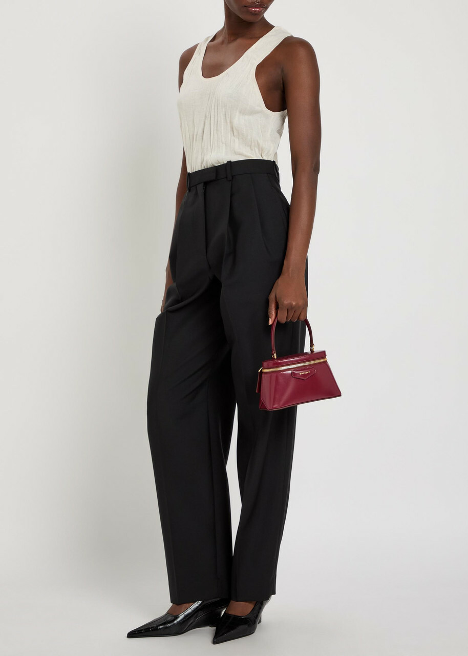 Givenchy Pleated Tapered-leg Wool and Mohair-blend Trousers Black