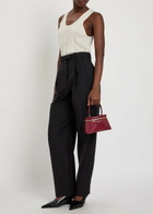Givenchy Pleated Tapered-leg Wool and Mohair-blend Trousers Black