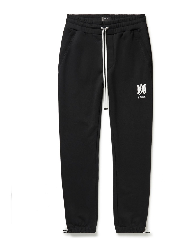 Photo: AMIRI - Tapered Logo-Print Cotton-Jersey Sweatpants - Black