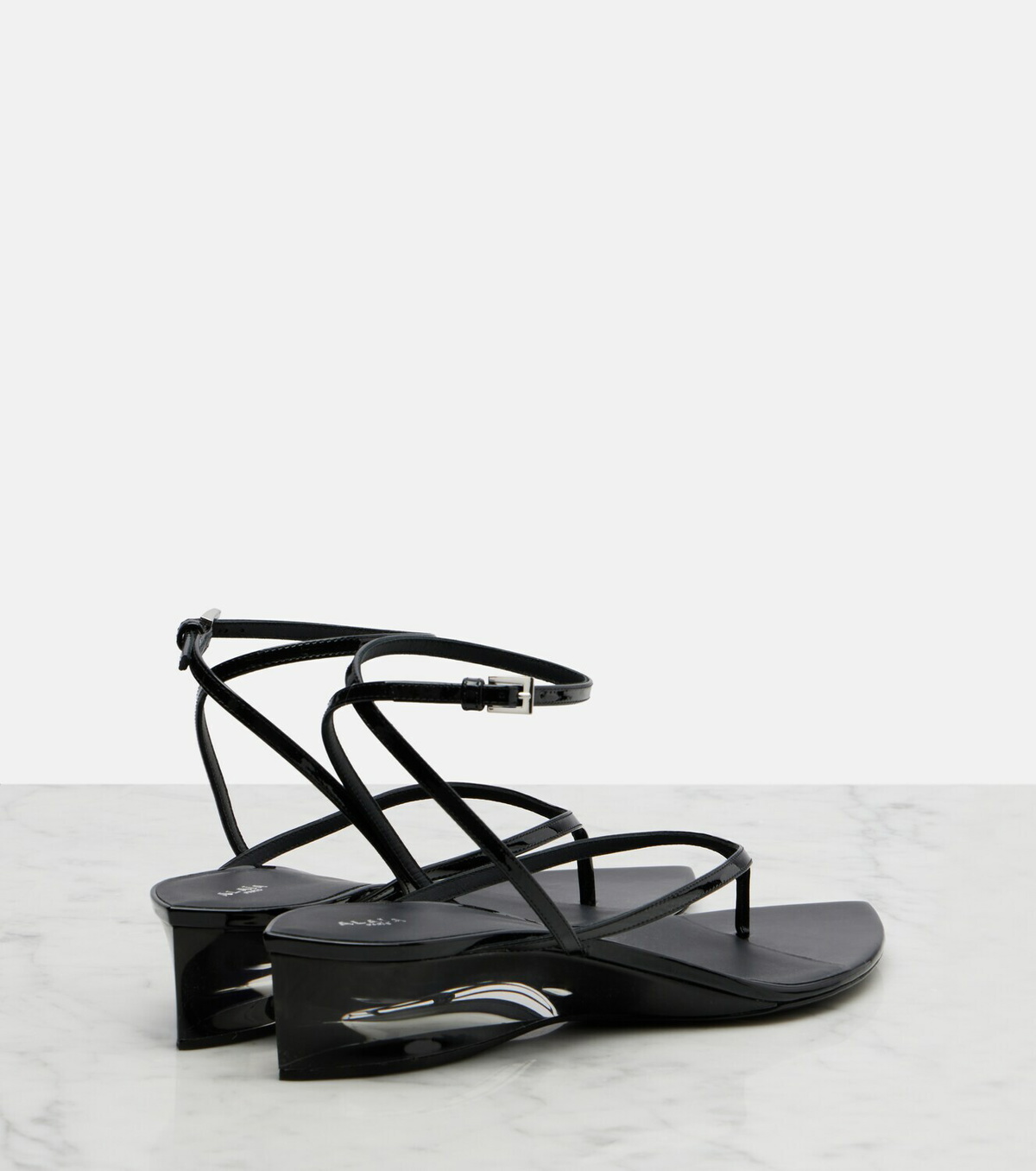Alaïa Invisible patent leather thong sandals