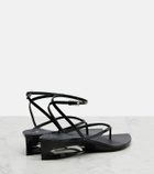Alaïa Invisible patent leather thong sandals