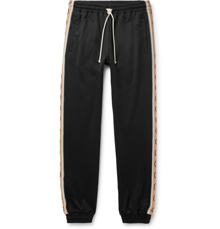 Photo: Gucci - Slim-Fit Logo-Jacquard Webbing-Trimmed Tech-Jersey Track Pants - Black