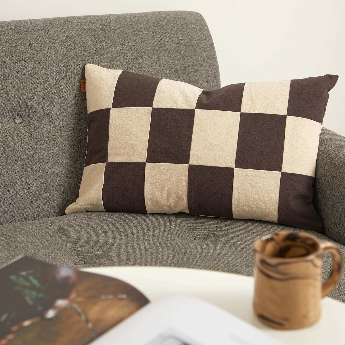 ferm LIVING Fold Patchwork Cushion in Coffee/Undyed 