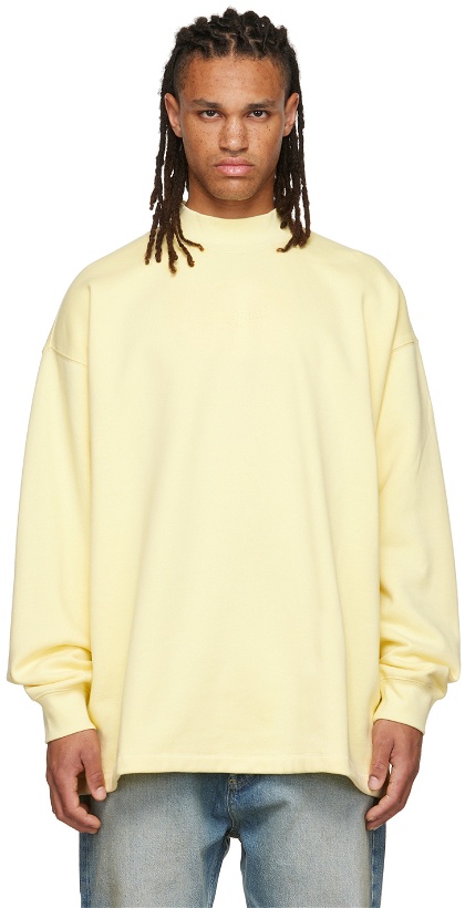 Photo: Fear of God ESSENTIALS Yellow Relaxed Sweatshirt