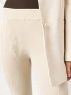 AERON Ribbed-Knit Flared Trousers