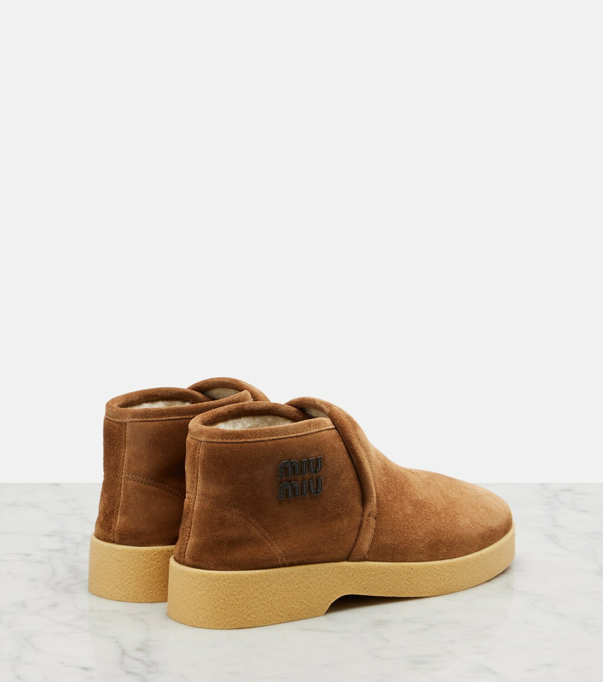 Miu Miu Shearling-lined suede boots