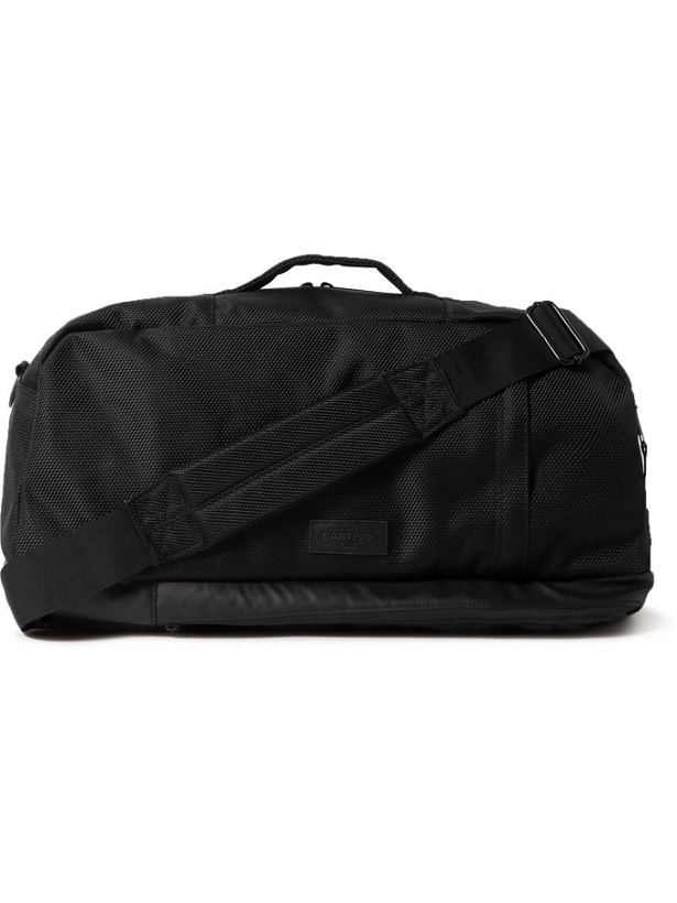 Photo: EASTPAK - Stand CNNT Convertible Coated-Canvas Holdall