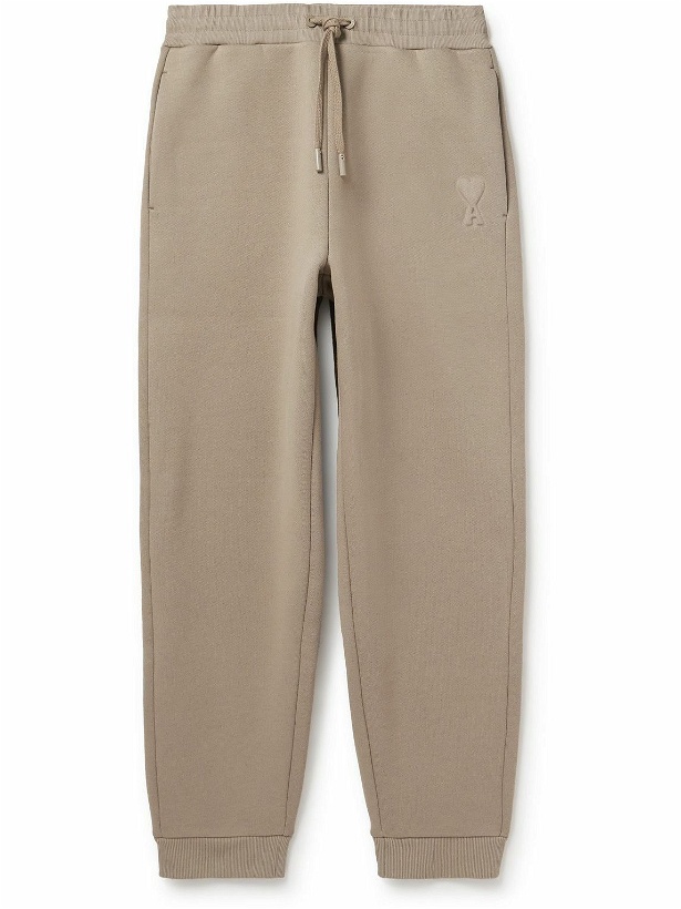 Photo: AMI PARIS - Tapered Logo-Embossed Cotton-Blend Sweatpants - Neutrals