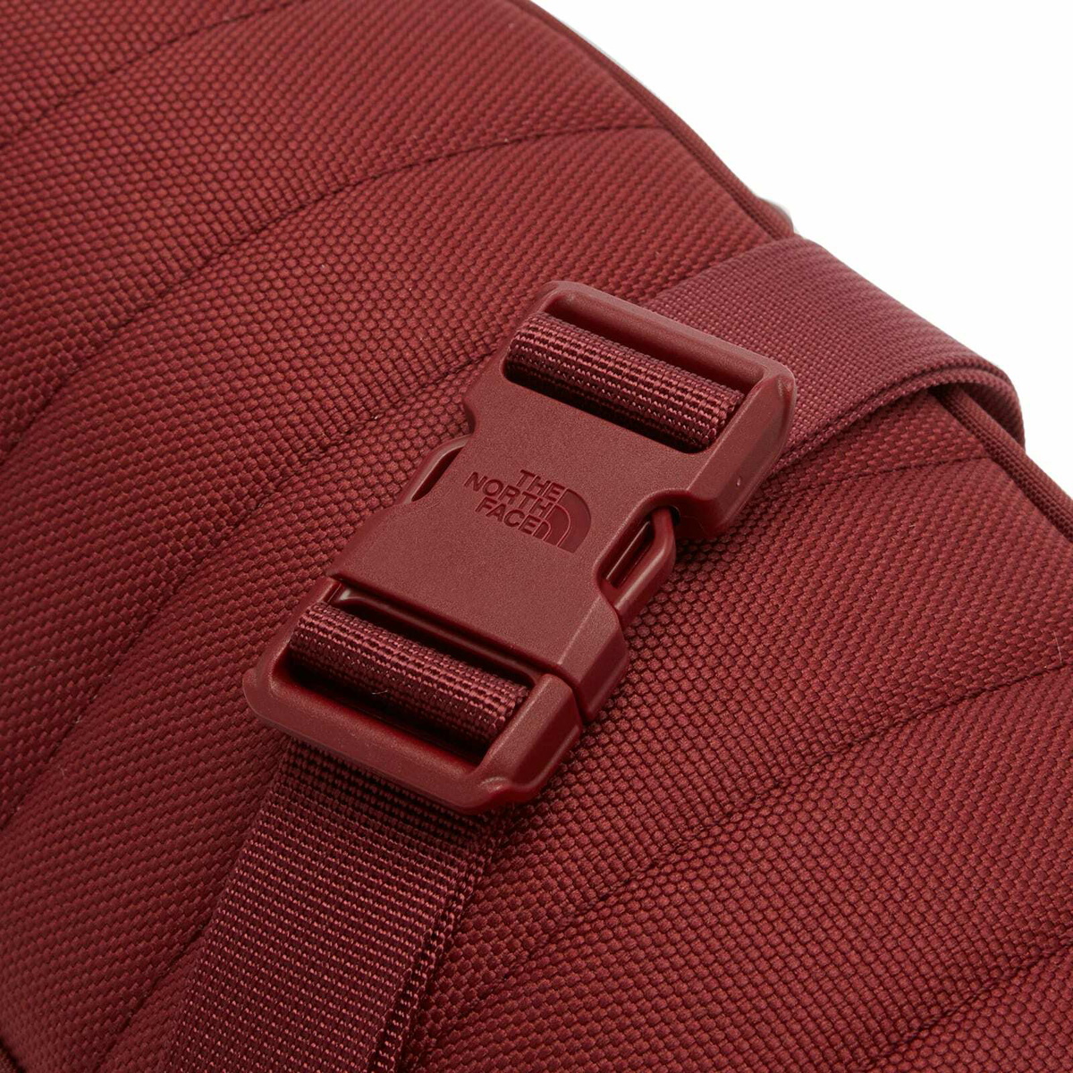 The North Face Women's Berkeley Lumbar Crossbody Bag in Sumac/Alpine Plum 