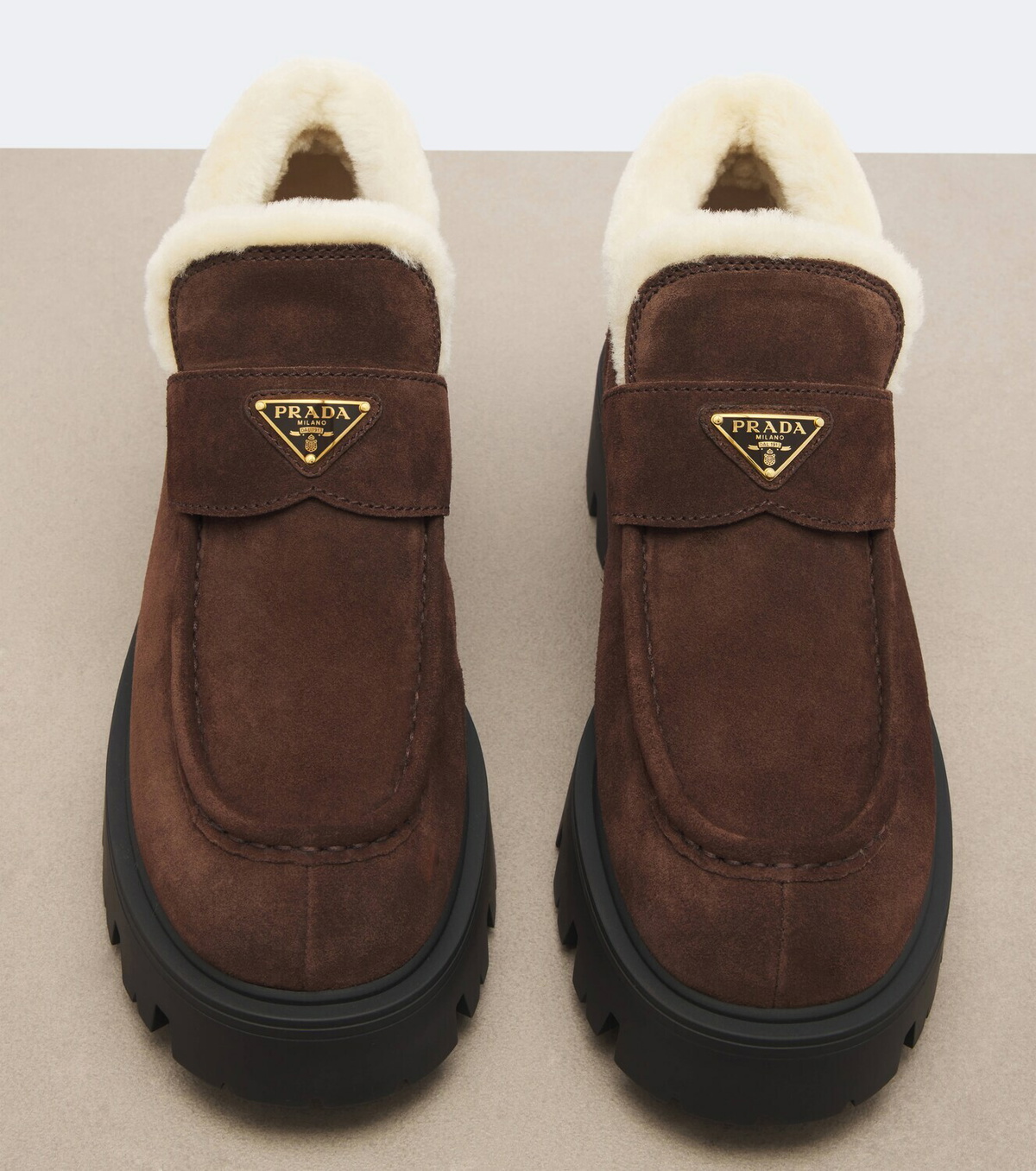 Prada Shearling-lined suede ankle boots