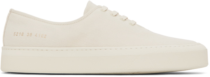 Photo: Common Projects Off-White Four Hole Sneakers