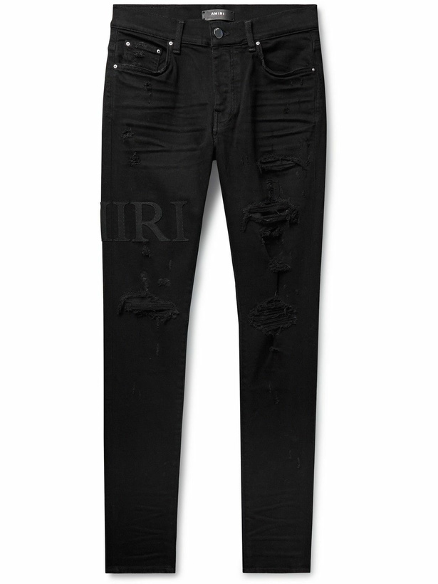 Photo: AMIRI - Skinny-Fit Logo-Appliquéd Distressed Jeans - Black