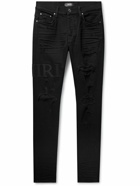 AMIRI - Skinny-Fit Logo-Appliquéd Distressed Jeans - Black