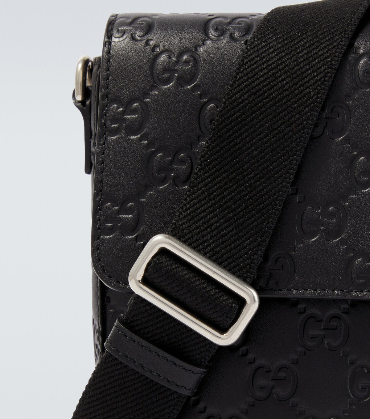 Gucci GG Emblem debossed leather phone pouch