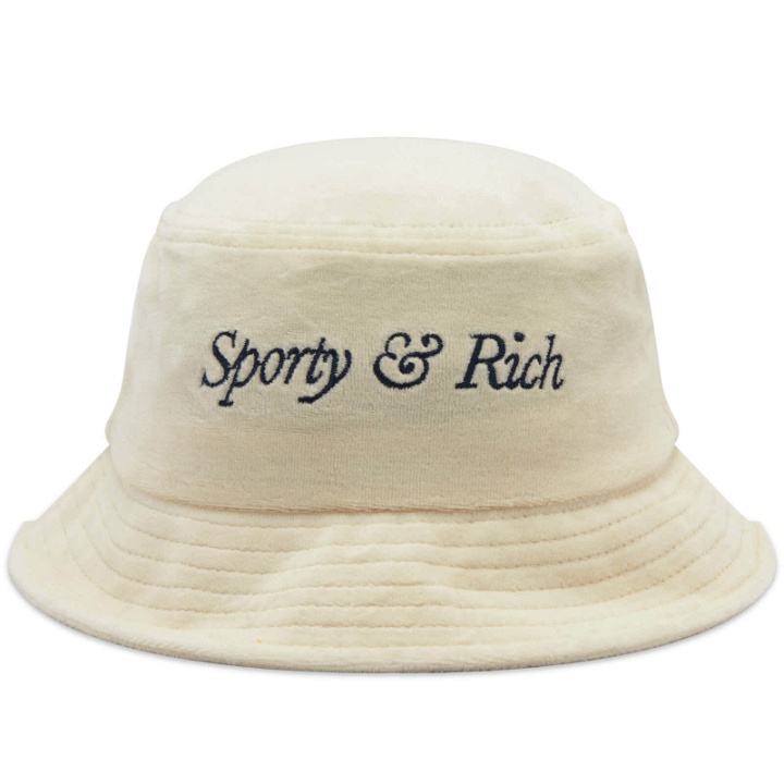 Photo: Sporty & Rich Italic Logo Velour Bucket Hat in Cream/Navy