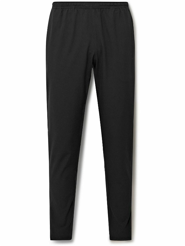 Photo: Outdoor Voices - High Stride Tapered Recycled-Shell Sweatpants - Black