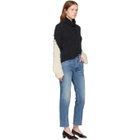 Wendelborn Black and Beige Oversized Chevron Sleeve Turtleneck