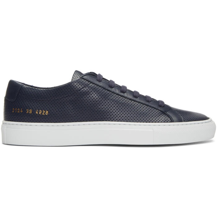 Photo: Common Projects Navy and White Achilles Low Perforated Sneakers 