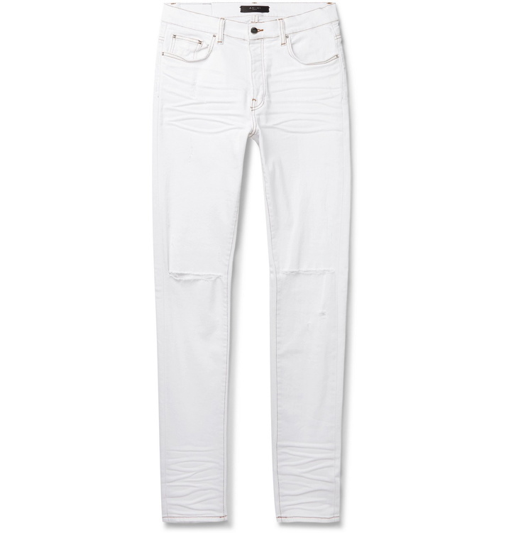 Photo: AMIRI - Slash Skinny-Fit Distressed Stretch-Denim Jeans - White