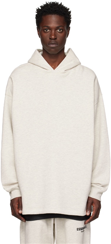 Photo: Fear of God ESSENTIALS Off-White Relaxed Hoodie