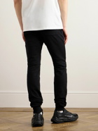 Balmain - Skinny Logo-Flocked Panelled Cotton-Jersey Sweatpants - Black