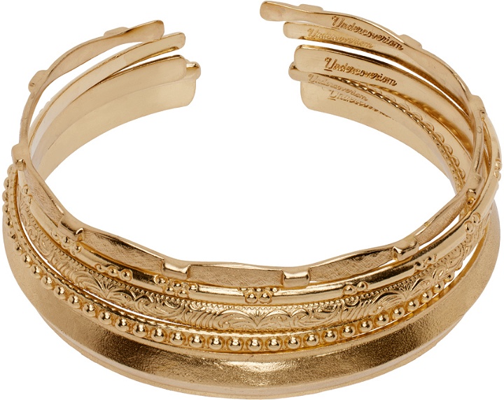 Photo: Undercoverism Gold Cuff Bracelet Set