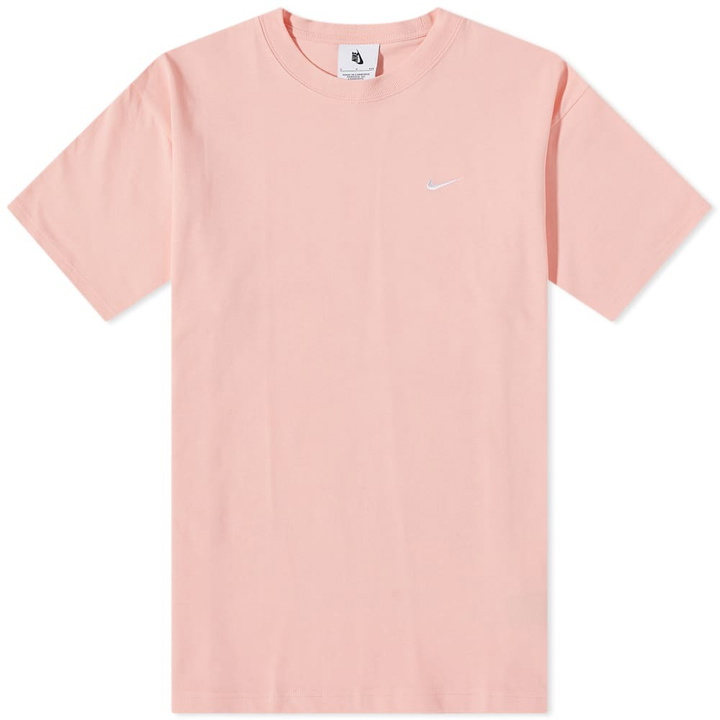 Photo: Nike Men's Solo Swoosh T-Shirt in Bleached Coral/White