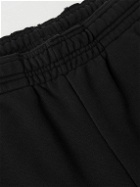 VETEMENTS - Straight-Leg Distressed Cotton-Blend Jersey Sweatpants - Black