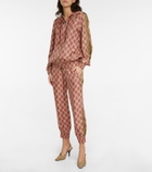 Gucci - GG Supreme printed silk sweatpants