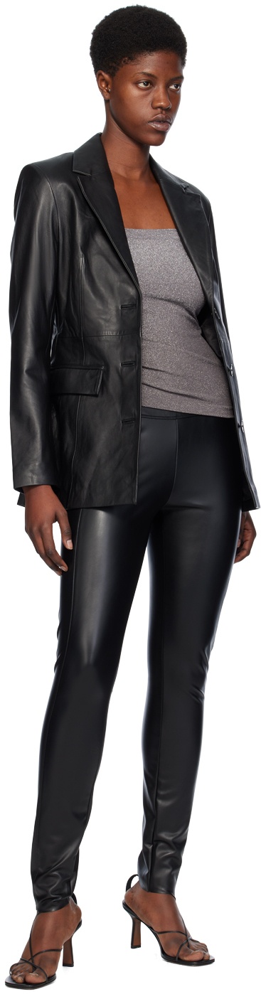 https://cdn.clothbase.com/uploads/dfefeaee-1ab1-4920-a71c-51208a2fd740/black-edie-forming-faux-leather-leggings.jpg